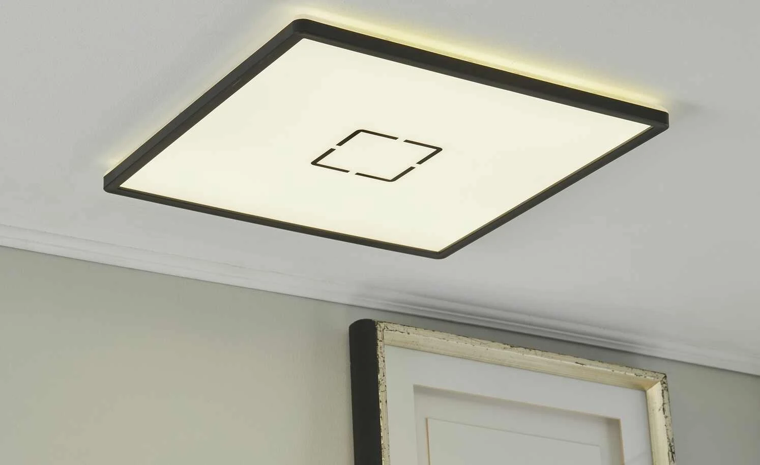 LED-Deckenleuchte, schwarz mit Hintergrundbeleuchtung 1 LED-Deckenleuchte, schwarz mit Hintergrundbeleuchtung